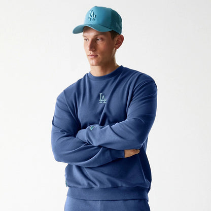 The Male model is wearing LA Dodgers MLB Midi League Essential Dark Blue Oversized Crew Neck Sweater 4
