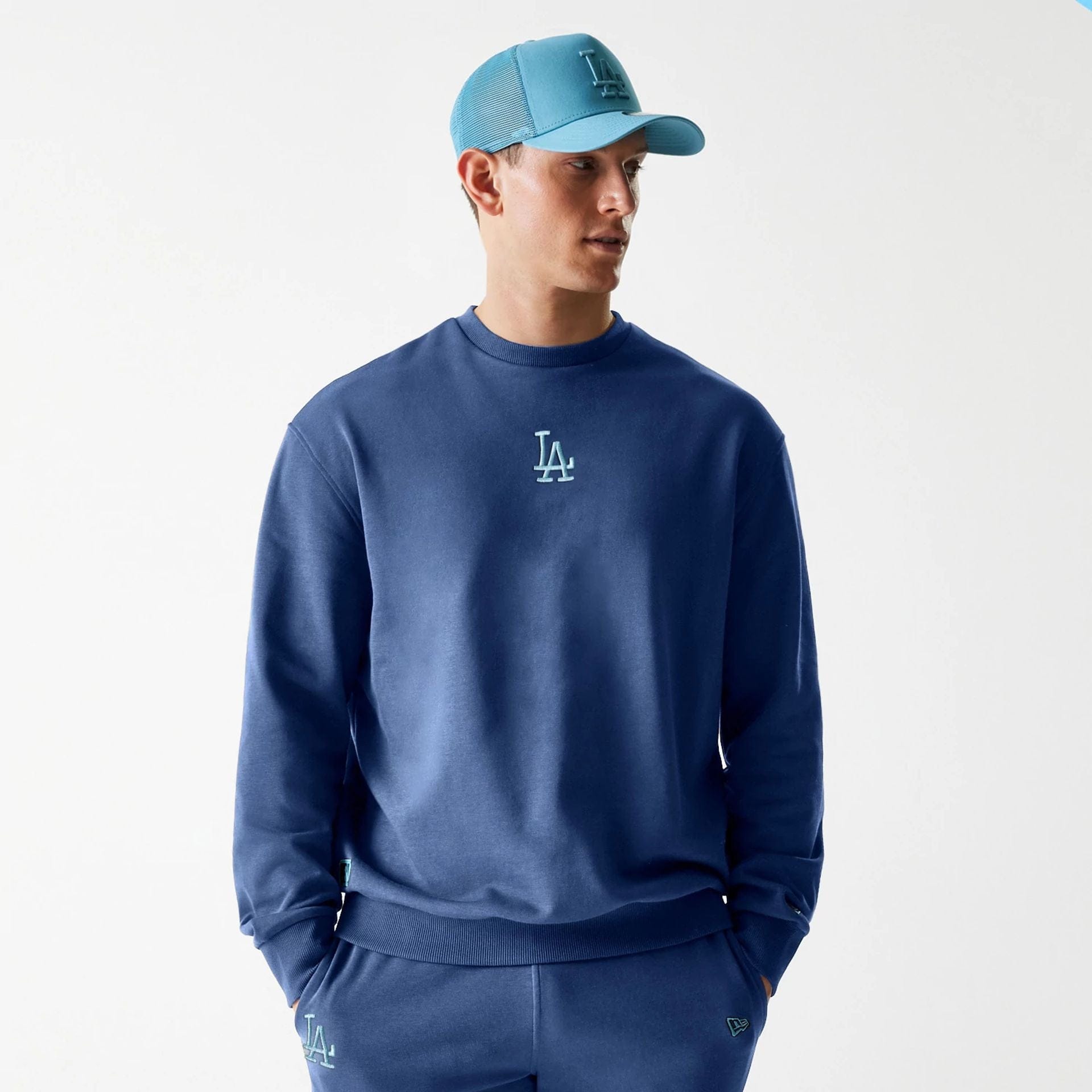 The Male model is wearing LA Dodgers MLB Midi League Essential Dark Blue Oversized Crew Neck Sweater 1