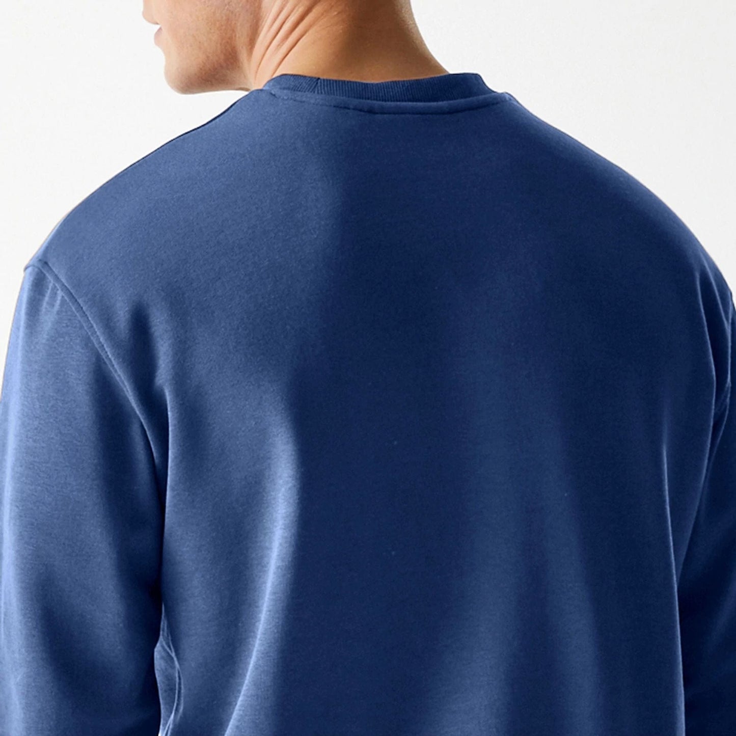 The Male model is wearing LA Dodgers MLB Midi League Essential Dark Blue Oversized Crew Neck Sweater 7