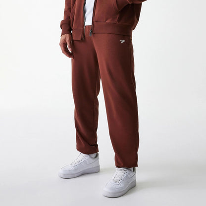 The Male model is wearing New York Yankees MLB Midi League Essential Brown Joggers 3