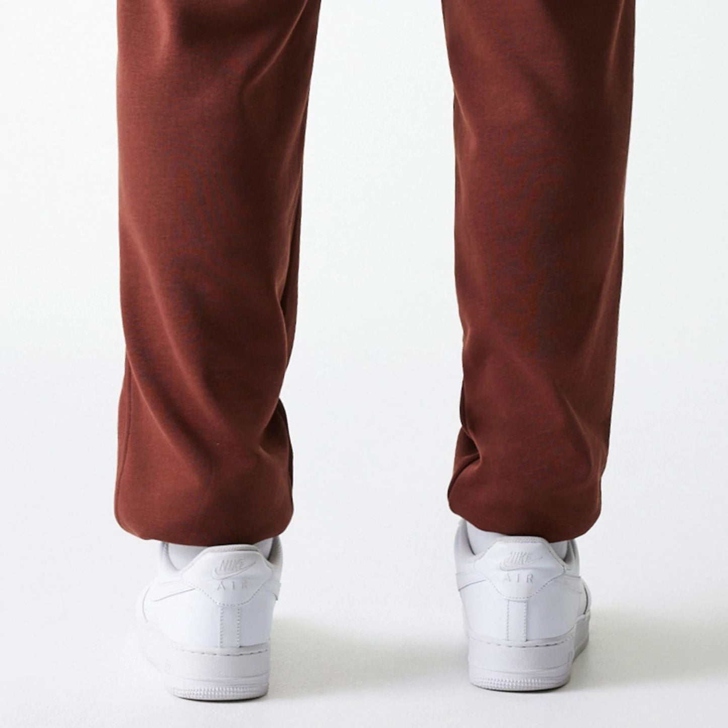 The Male model is wearing New York Yankees MLB Midi League Essential Brown Joggers 7
