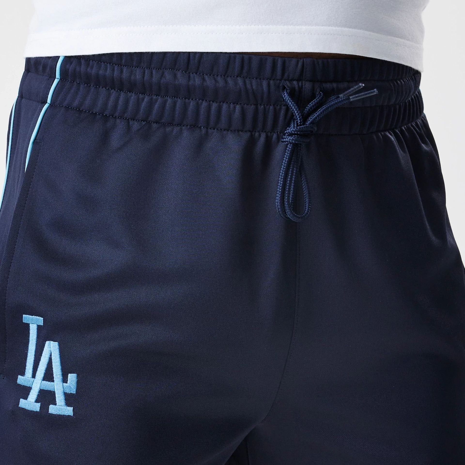 The Male model is wearing LA Dodgers MLB Navy Track Pants 6