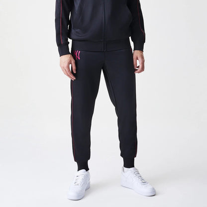 The Male model is wearing New York Yankees MLB Piping Black Track Pants 3
