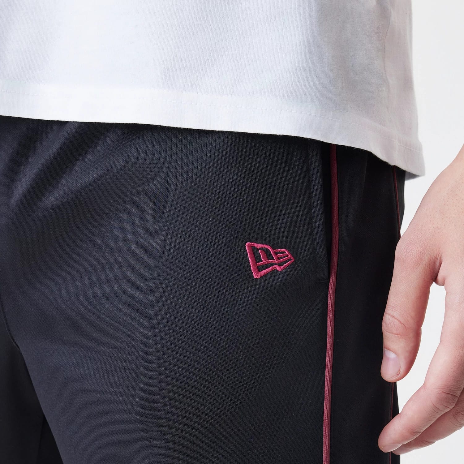 The Male model is wearing New York Yankees MLB Piping Black Track Pants 5