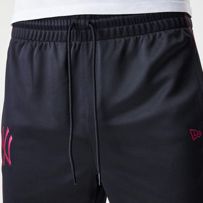 The Male model is wearing New York Yankees MLB Piping Black Track Pants 6