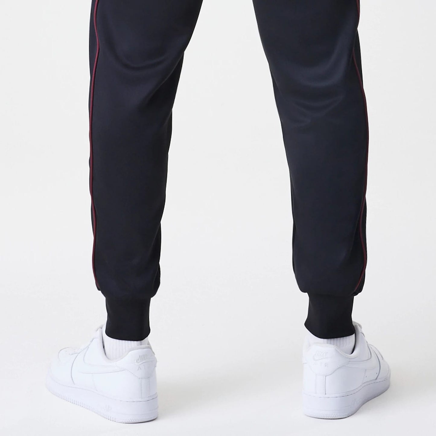The Male model is wearing New York Yankees MLB Piping Black Track Pants 7