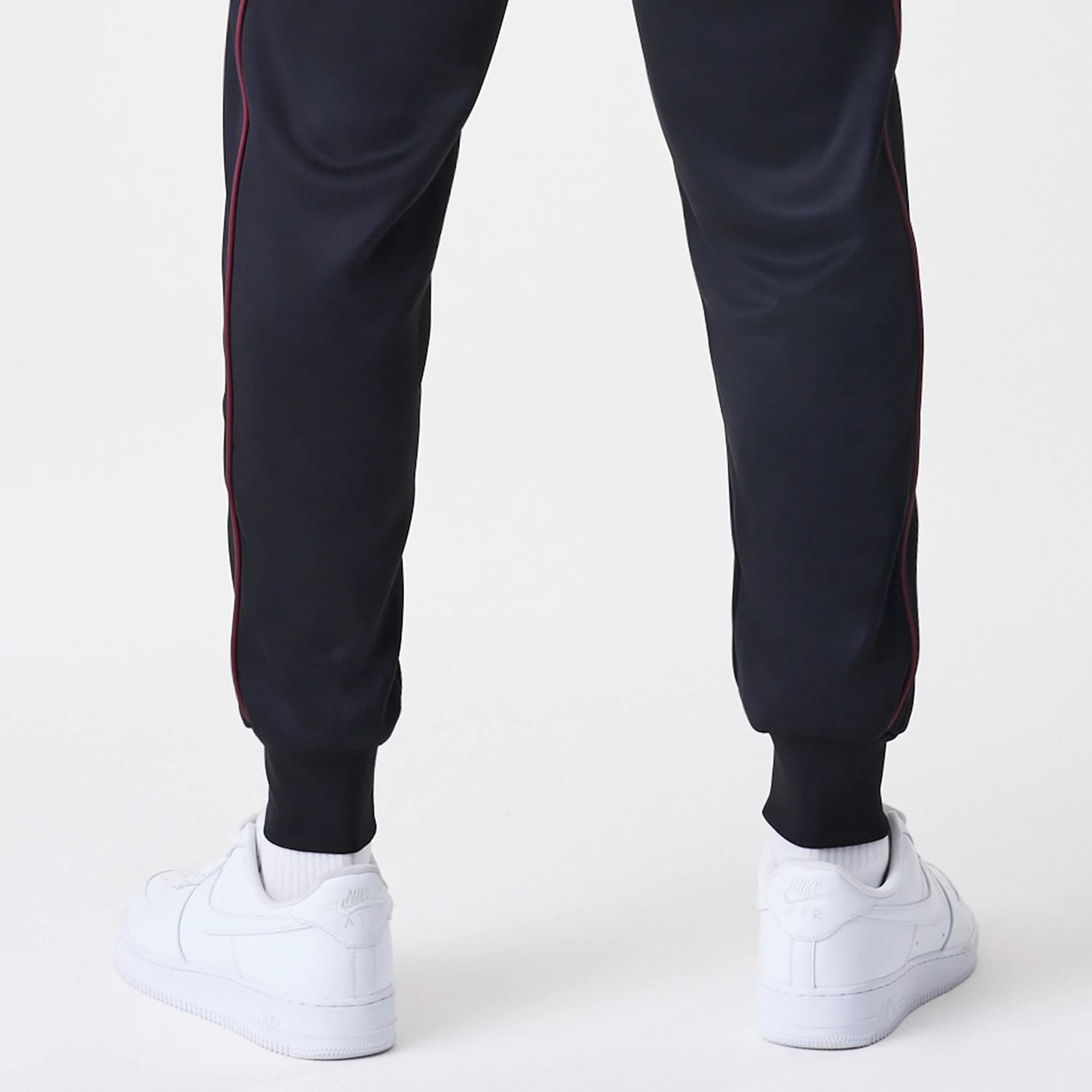 The Male model is wearing New York Yankees MLB Piping Black Track Pants 7