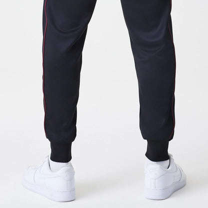 The Male model is wearing New York Yankees MLB Piping Black Track Pants 7