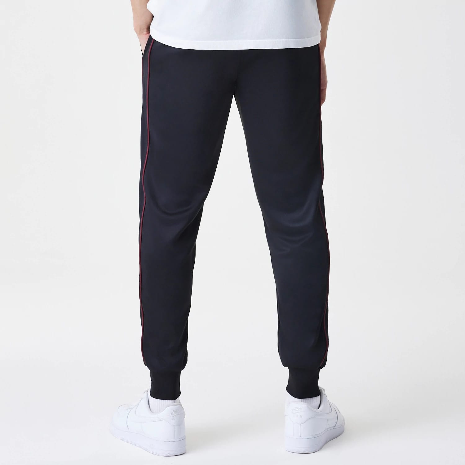 The Male model is wearing New York Yankees MLB Piping Black Track Pants 2