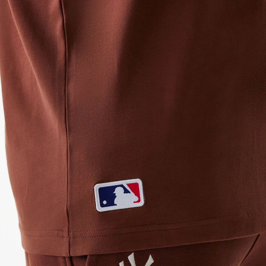 The Male model is wearing New York Yankees MLB Midi League Essential Brown Oversized T-Shirt 6