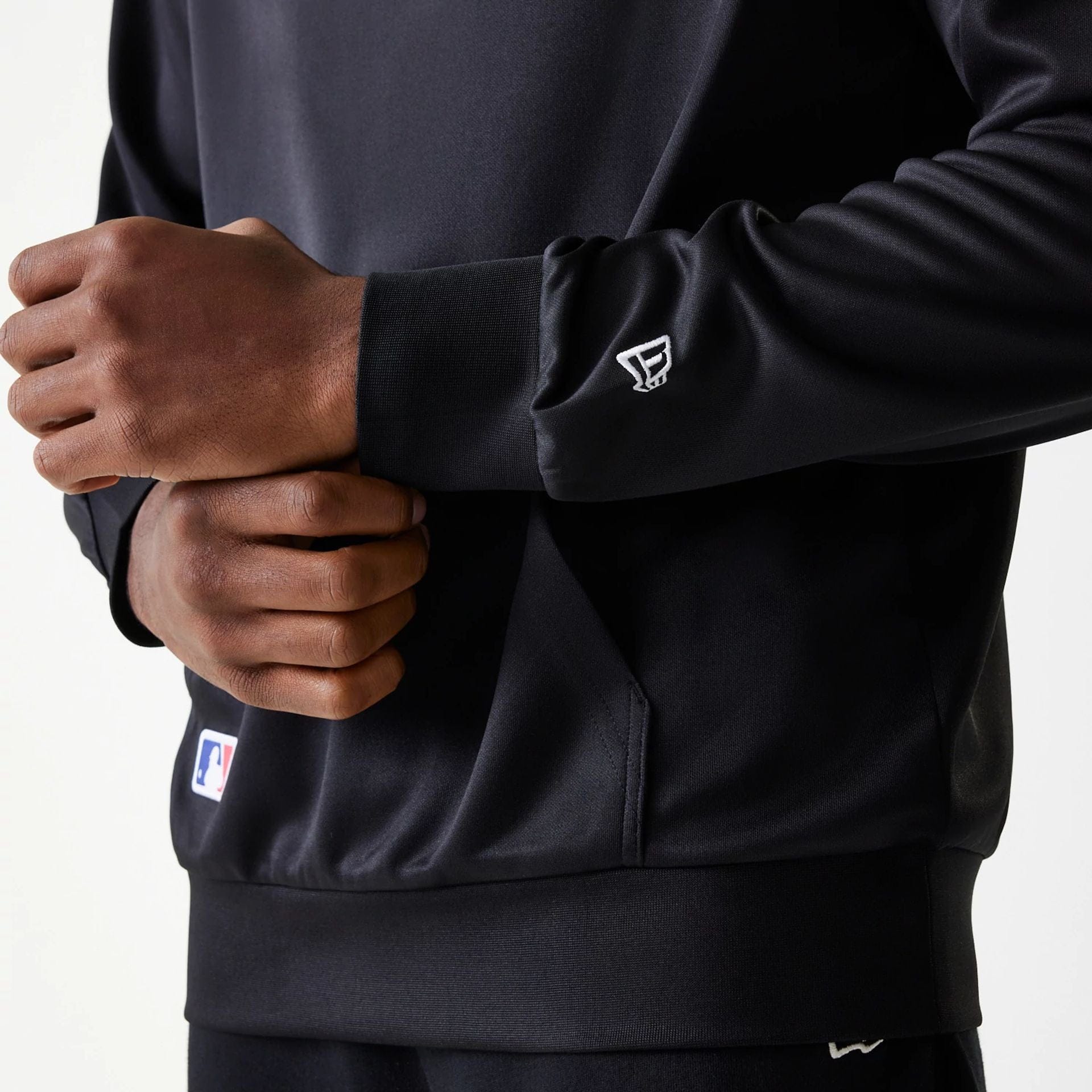 The Male model is wearing New York Yankees MLB Essentials Black Pullover Hoodie 5