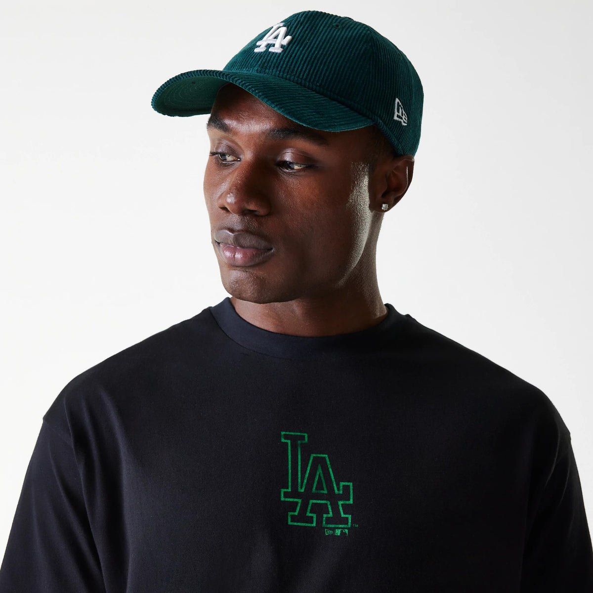 The Male model is wearing LA Dodgers MLB World Series Black Oversized T-Shirt 5