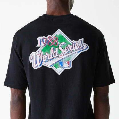 The Male model is wearing LA Dodgers MLB World Series Black Oversized T-Shirt 4