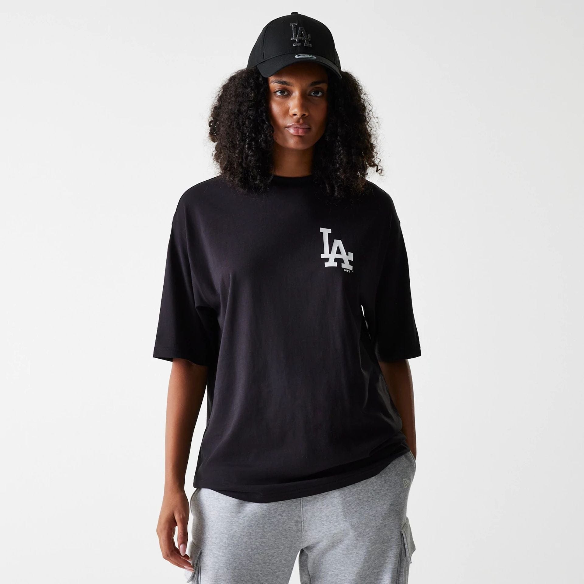 The Male model is wearing LA Dodgers MLB Food Graphic Black Oversized T-Shirt 4