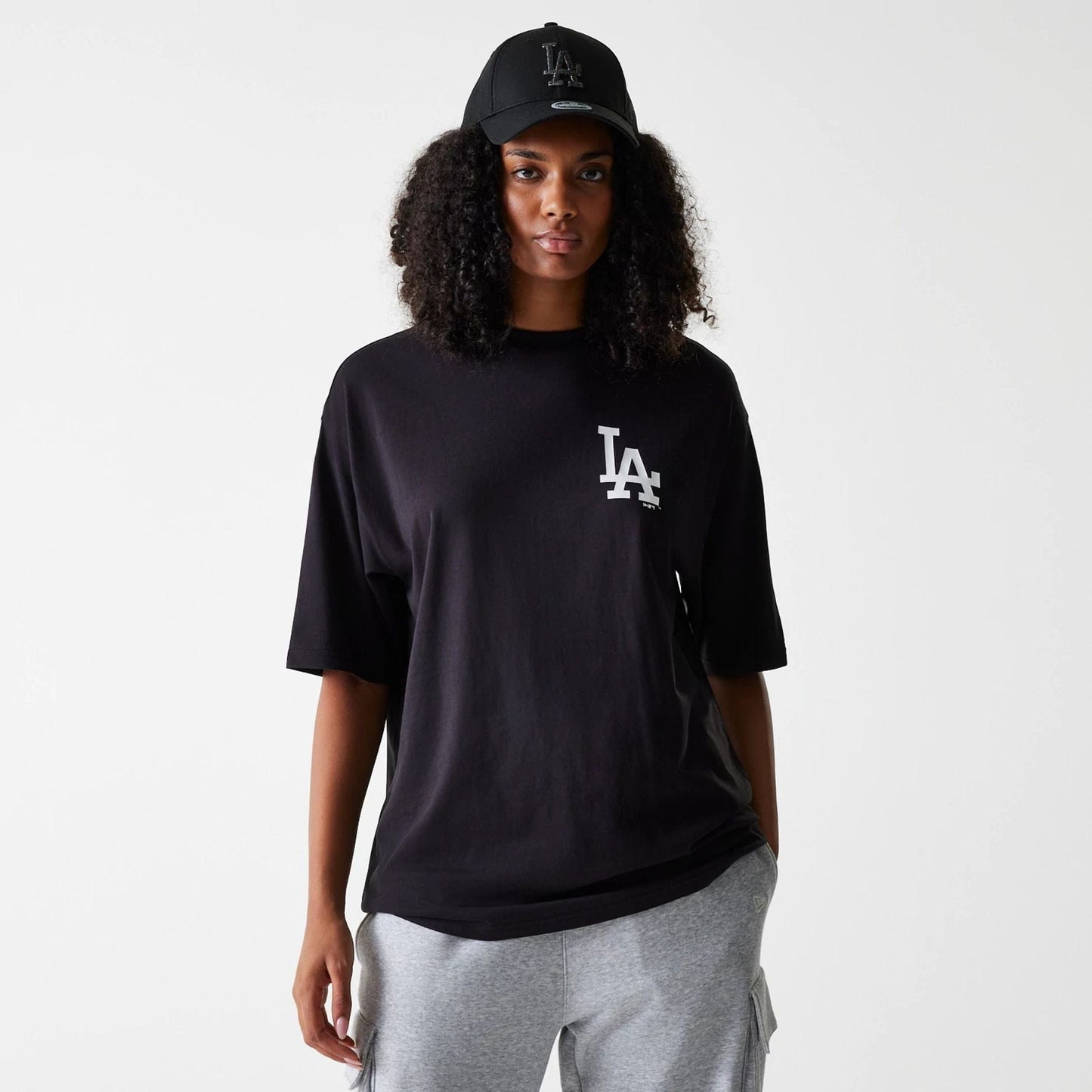 The Male model is wearing LA Dodgers MLB Food Graphic Black Oversized T-Shirt 4