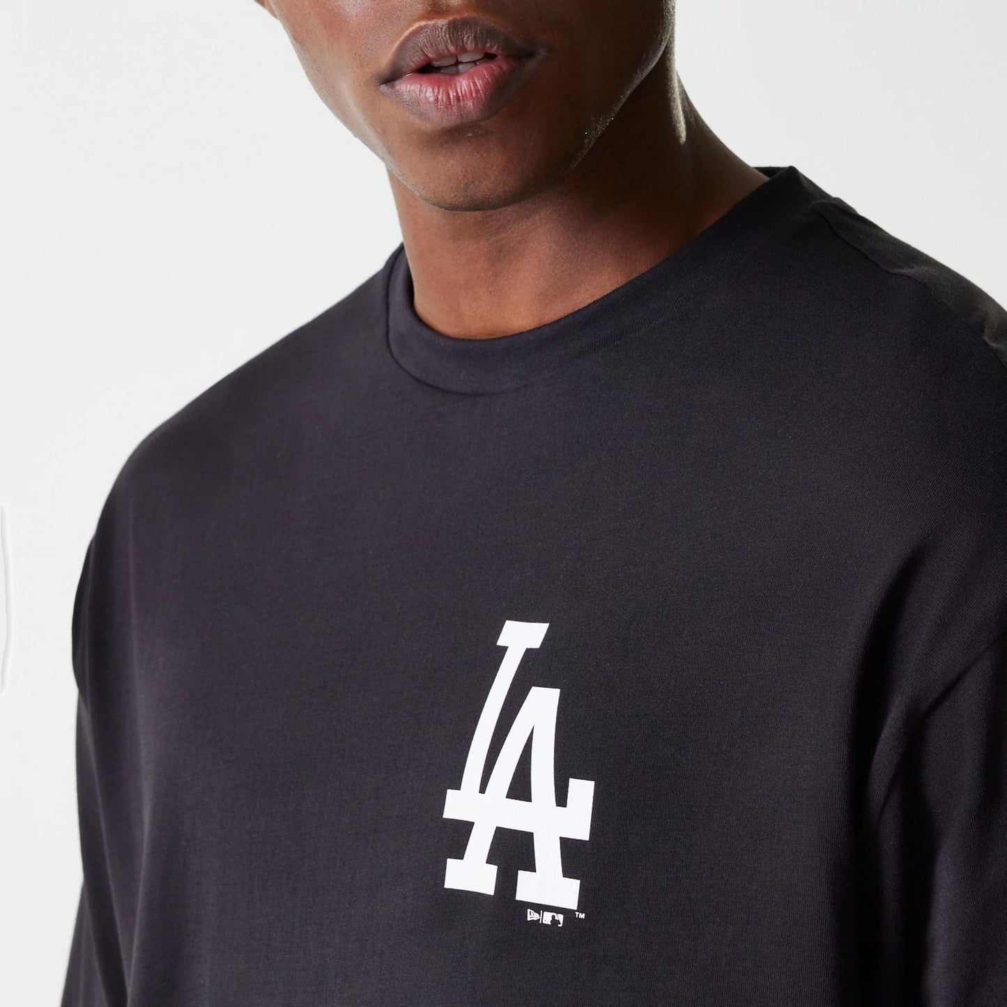 The Male model is wearing LA Dodgers MLB Food Graphic Black Oversized T-Shirt 5