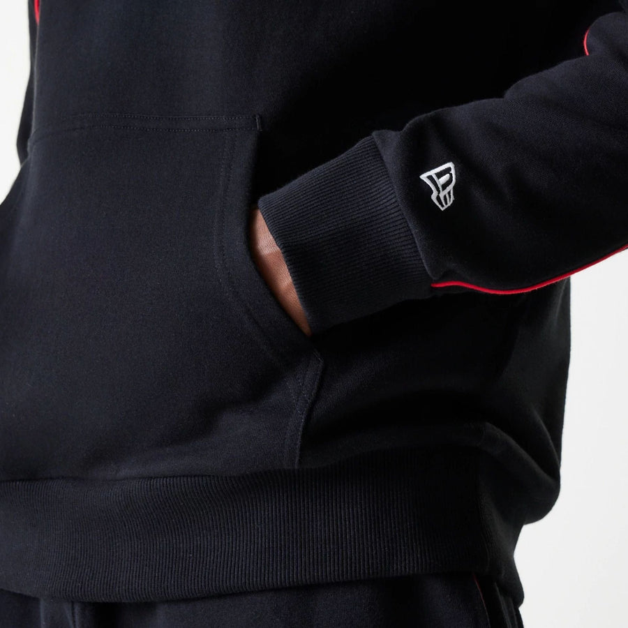 The Male model is wearing Chicago Bulls NBA Piping Black Oversized Pullover Hoodie 4