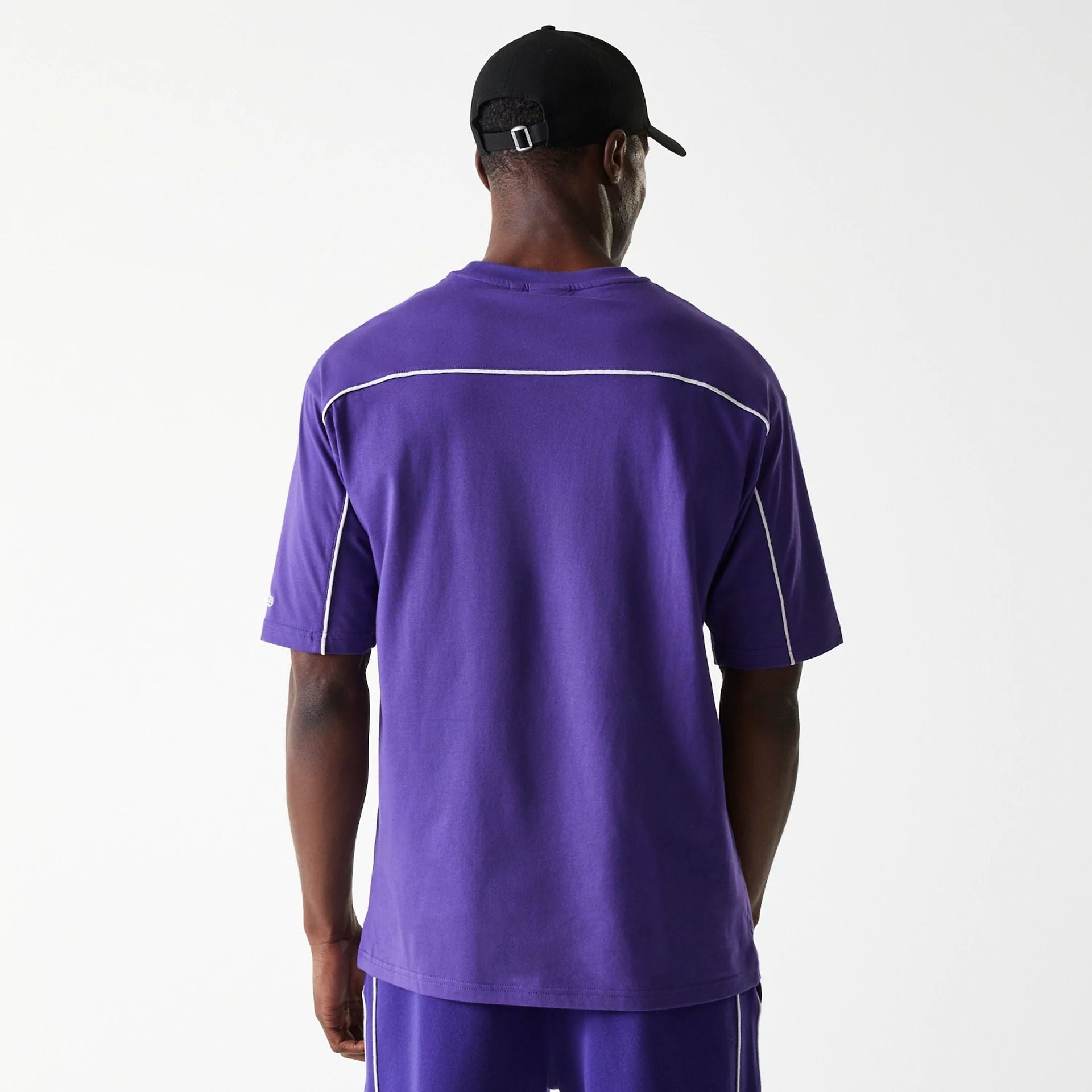 The Male model is wearing LA Lakers NBA Piping Purple Oversized T-Shirt 2