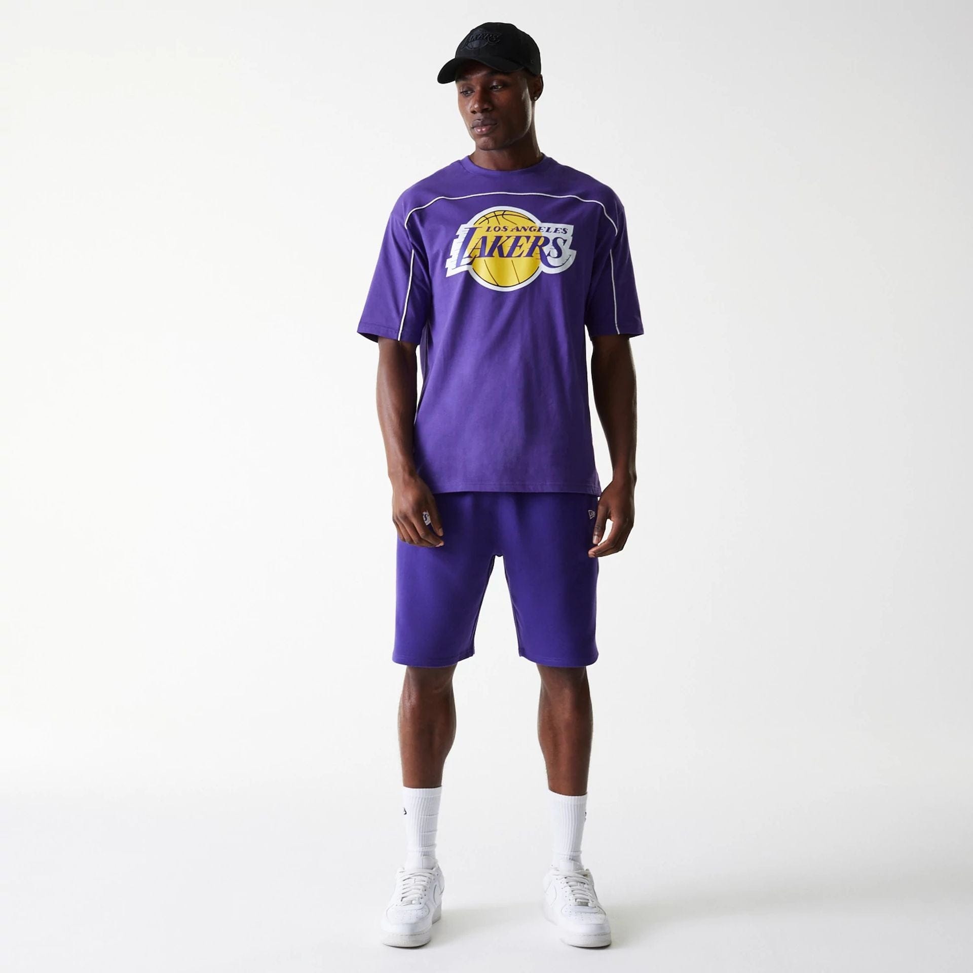 The Male model is wearing LA Lakers NBA Piping Purple Oversized T-Shirt 8