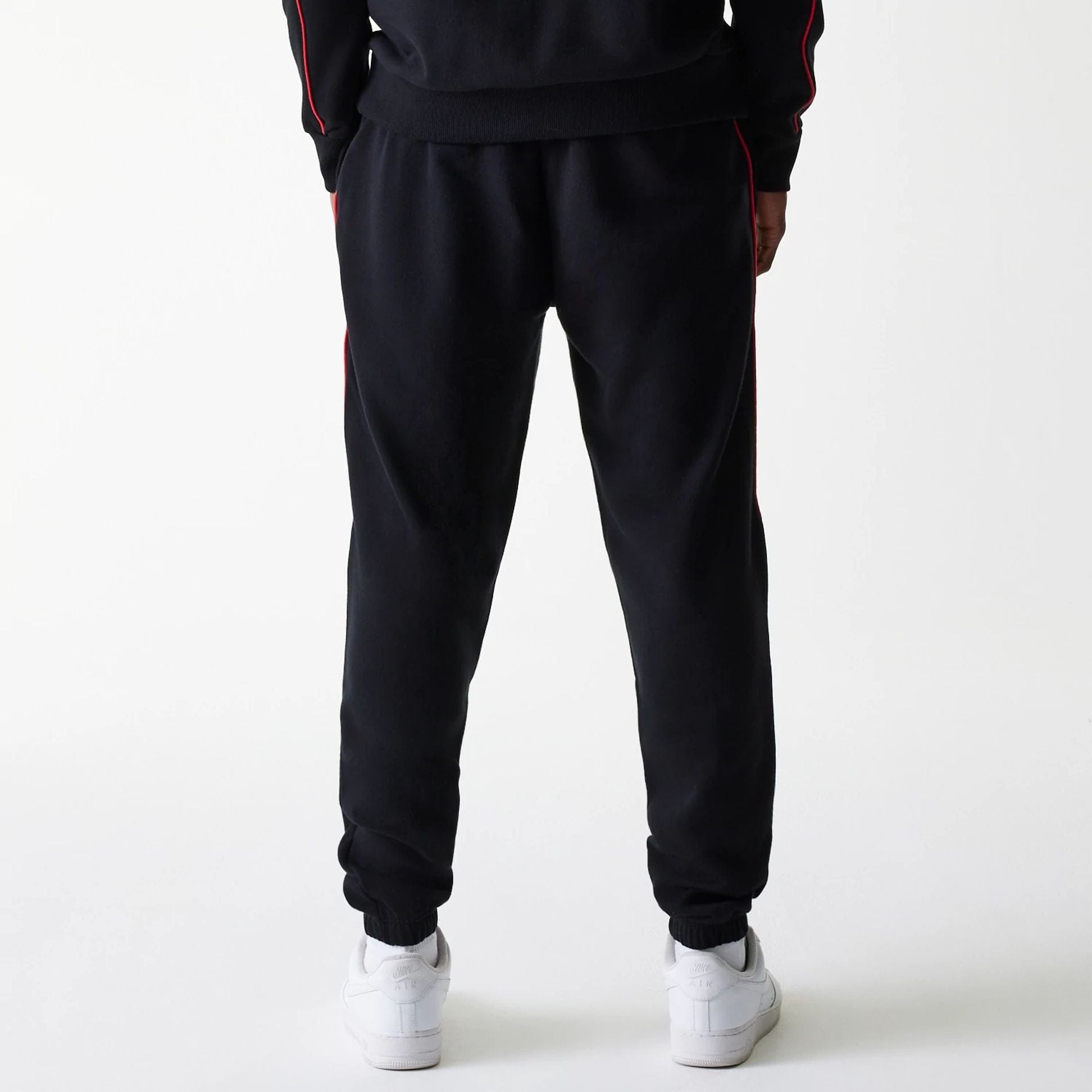 The Male model is wearing Chicago Bulls NBA Piping Black Joggers 2