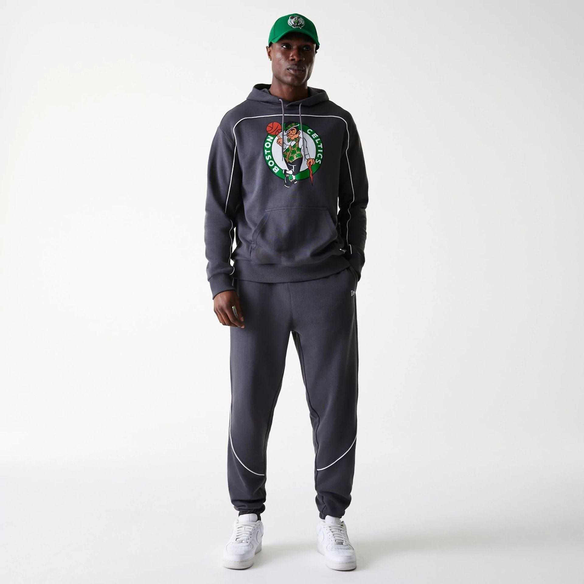 The Male model is wearing Boston Celtics NBA Piping Dark Grey Joggers 8