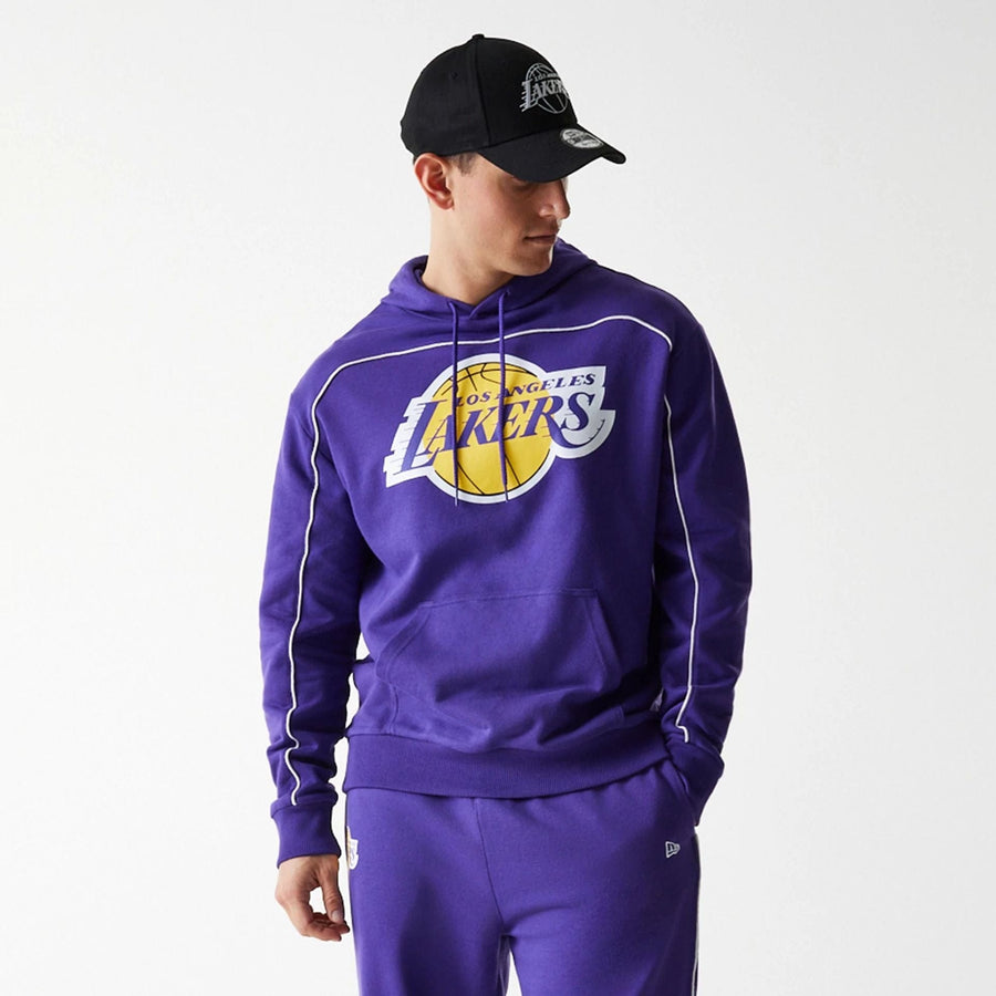The Male model is wearing LA Lakers NBA Piping Purple Oversized Pullover Hoodie 8