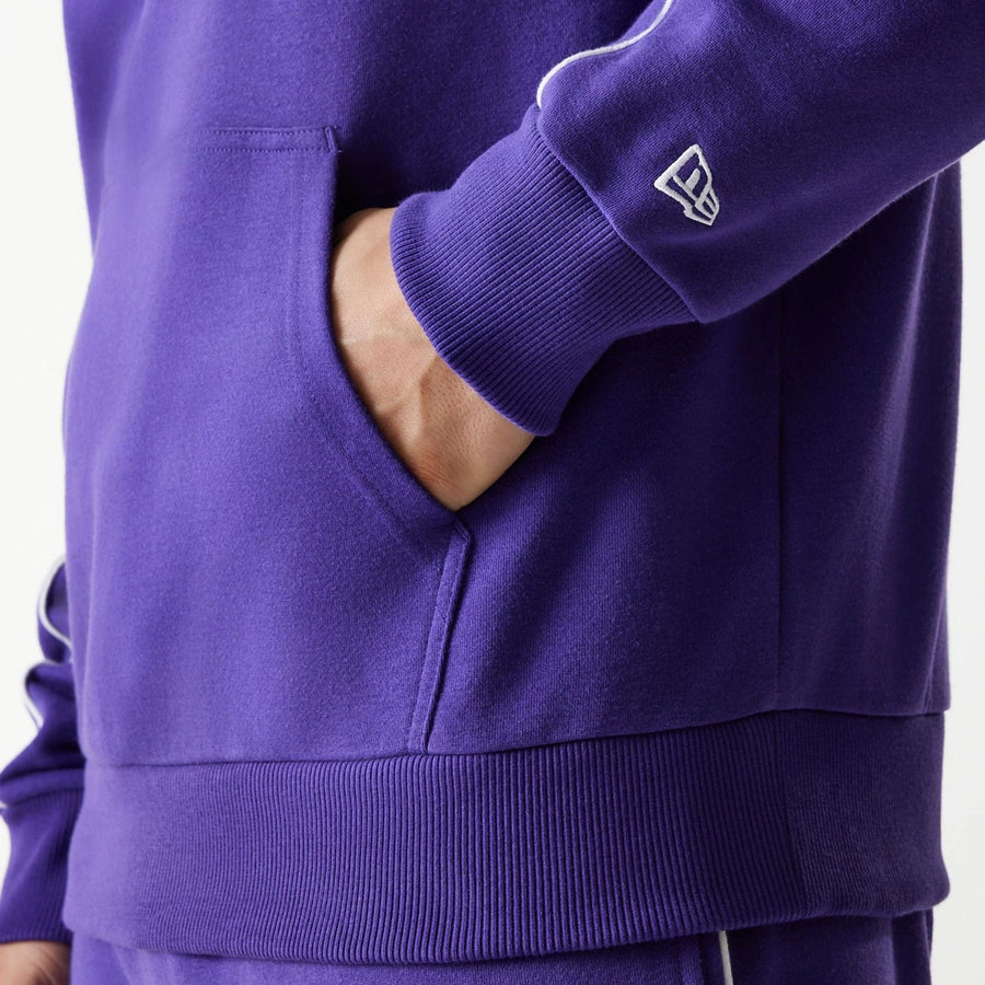 The Male model is wearing LA Lakers NBA Piping Purple Oversized Pullover Hoodie 5