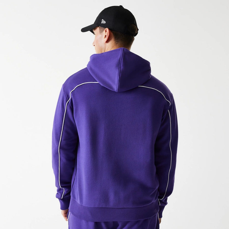 The Male model is wearing LA Lakers NBA Piping Purple Oversized Pullover Hoodie 2