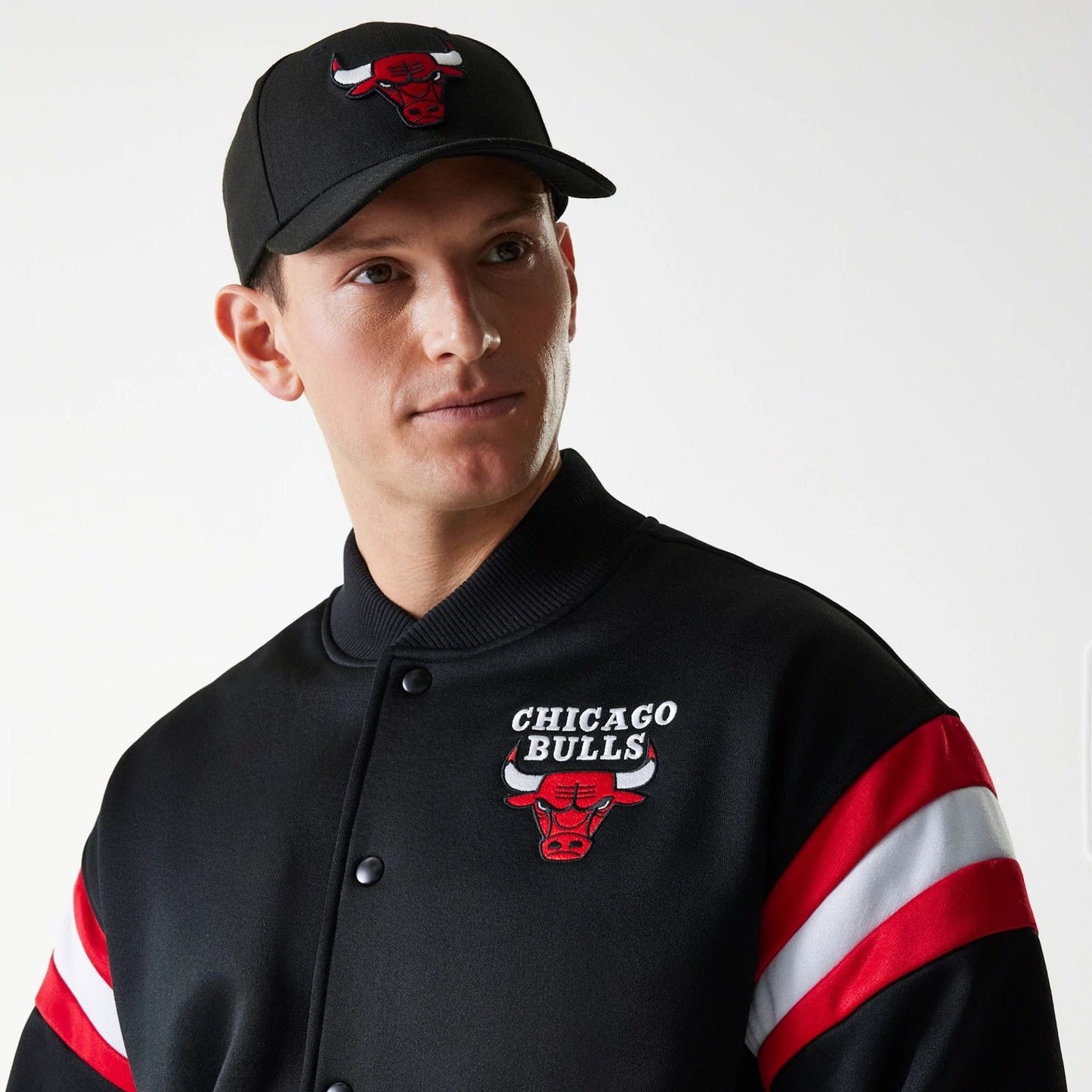 The Male model is wearing Chicago Bulls NBA Panel Black Bomber Jacket 4