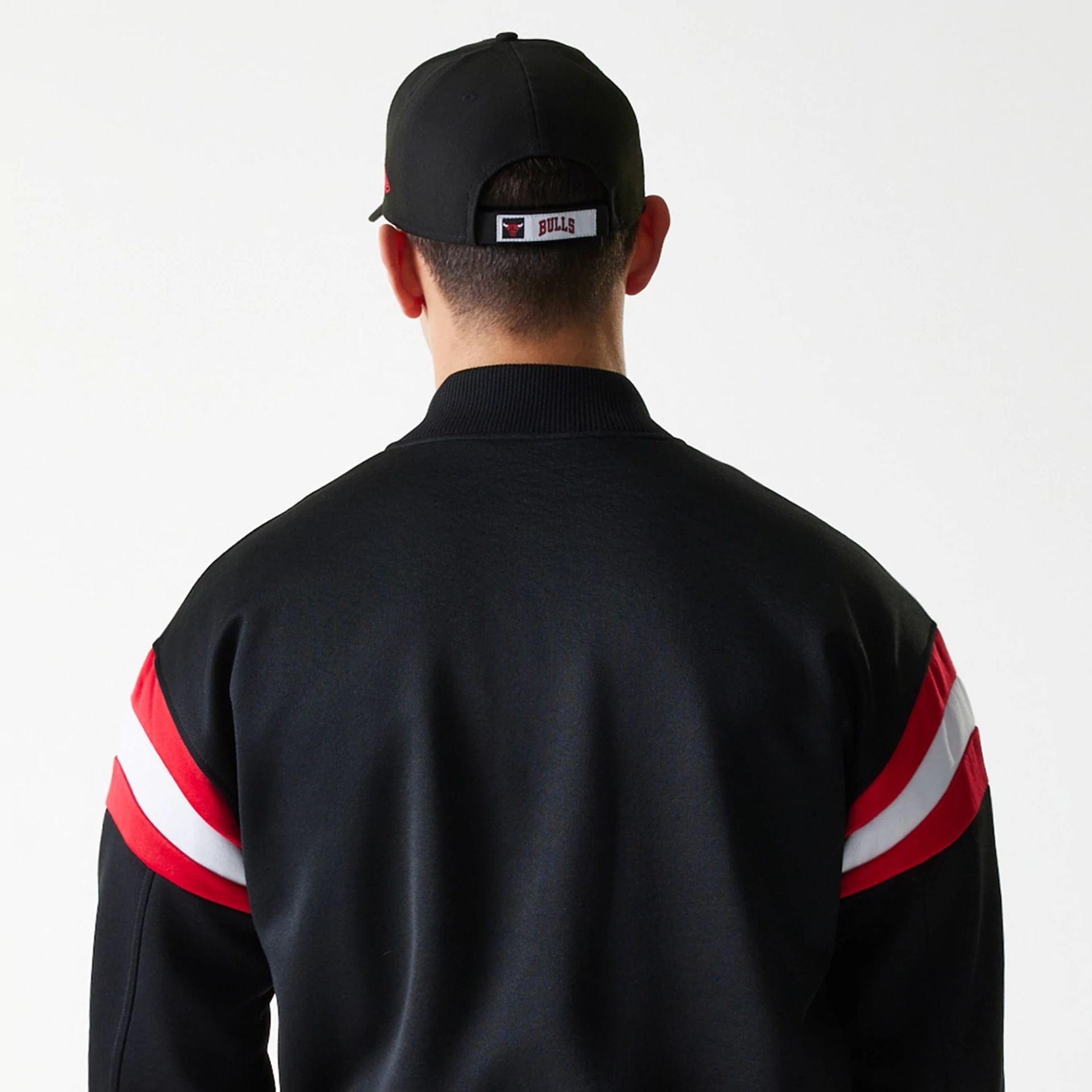 The Male model is wearing Chicago Bulls NBA Panel Black Bomber Jacket 7