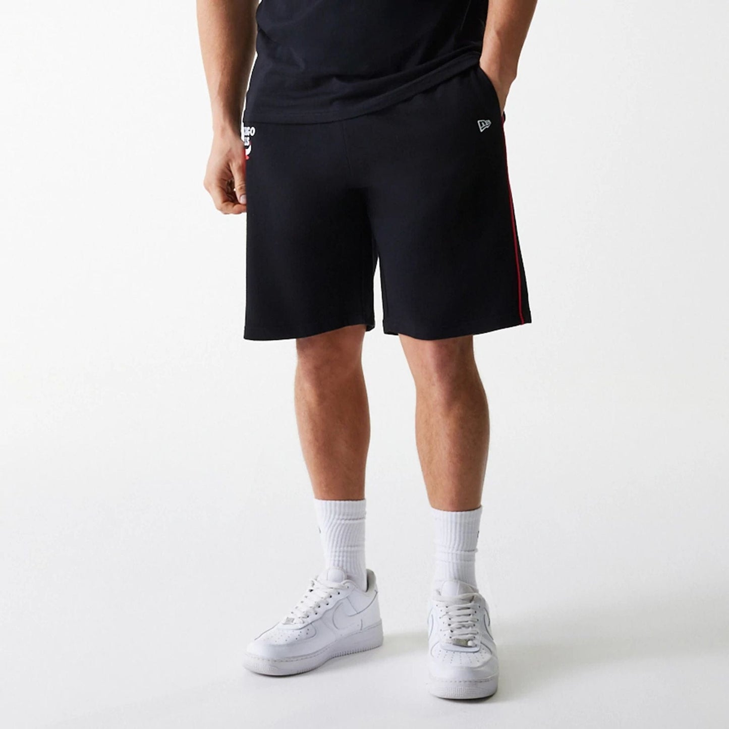 The Male model is wearing Chicago Bulls NBA Piping Black Shorts 7