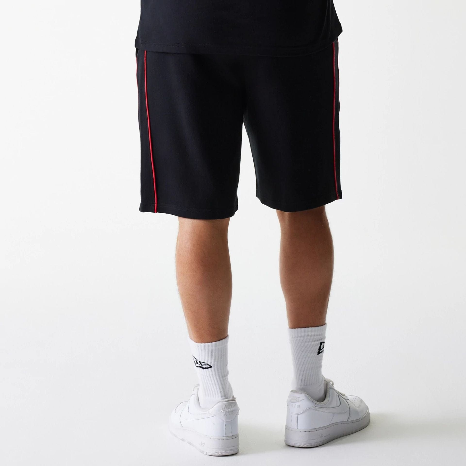 The Male model is wearing Chicago Bulls NBA Piping Black Shorts 2