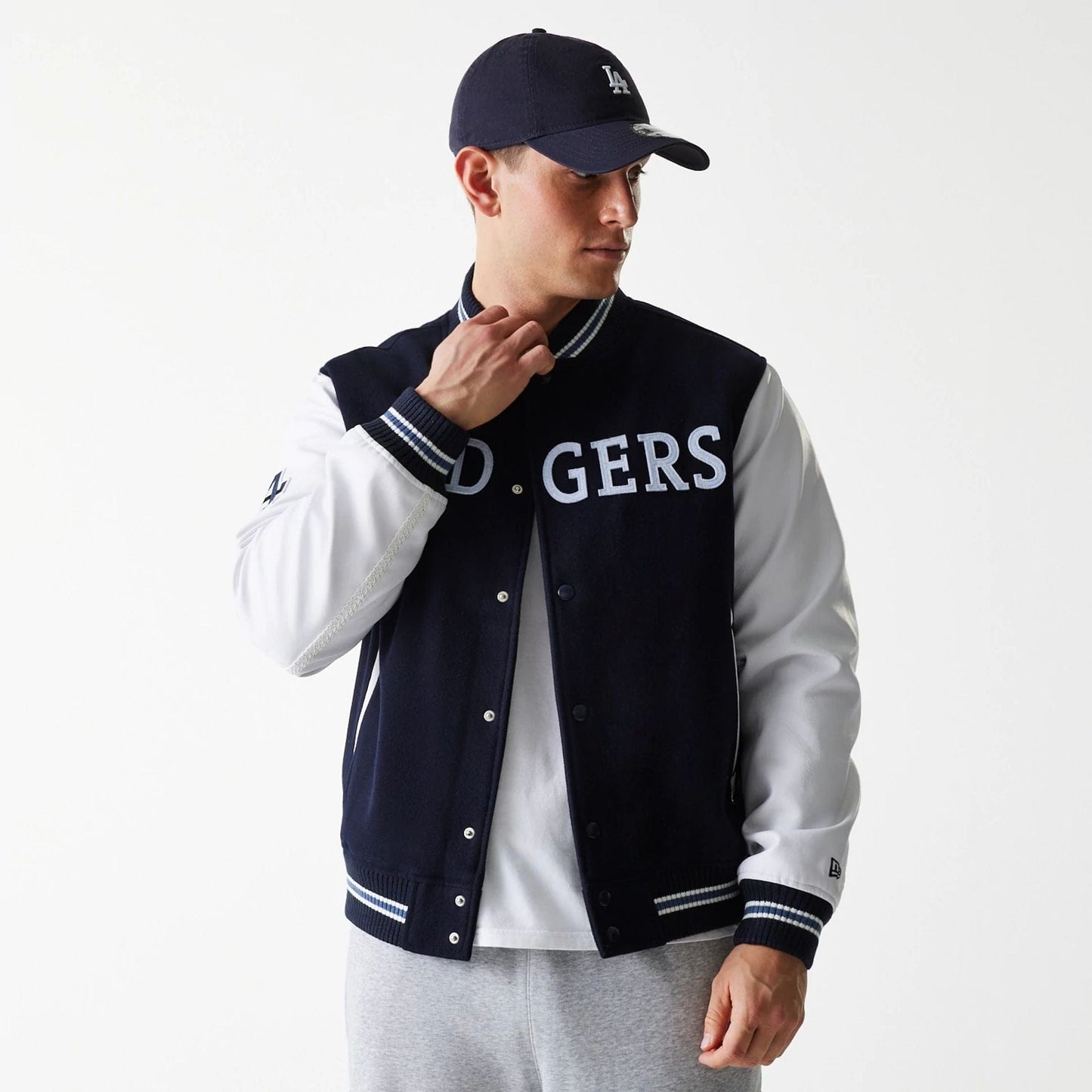 The Male model is wearing LA Dodgers MLB Wordmark Navy Varsity Jacket 3