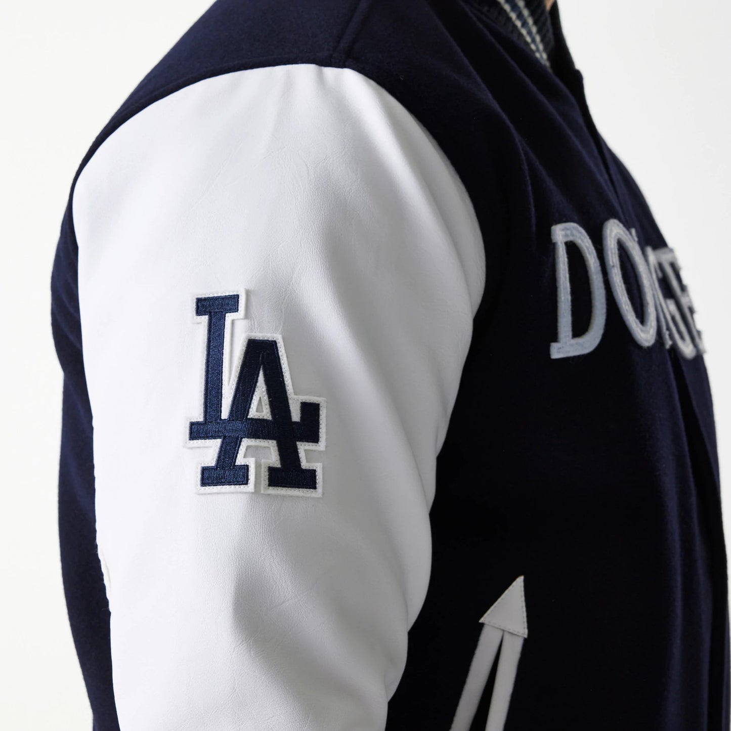 The Male model is wearing LA Dodgers MLB Wordmark Navy Varsity Jacket 4