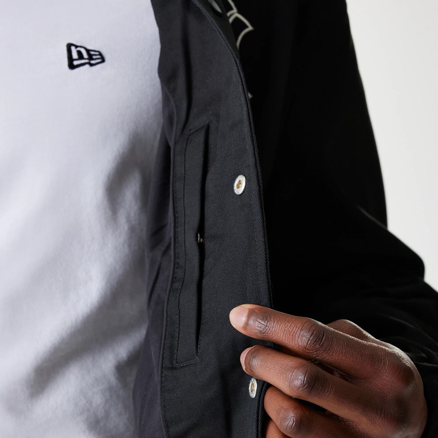 The Male model is wearing New York Yankees MLB Twill Black Coaches Jacket 6