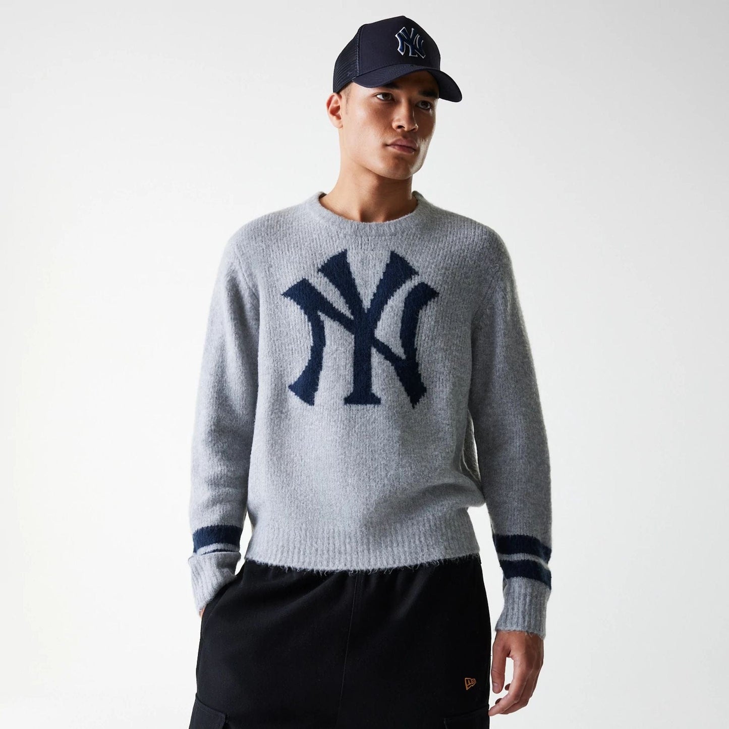 The Male model is wearing New York Yankees MLB Knit Grey Oversized Knit Sweater 3