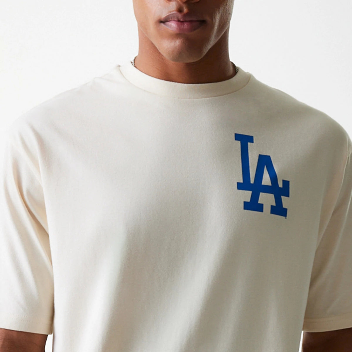 The Male model is wearing LA Dodgers MLB Baseball Graphic Light Beige Oversized T-Shirt 5