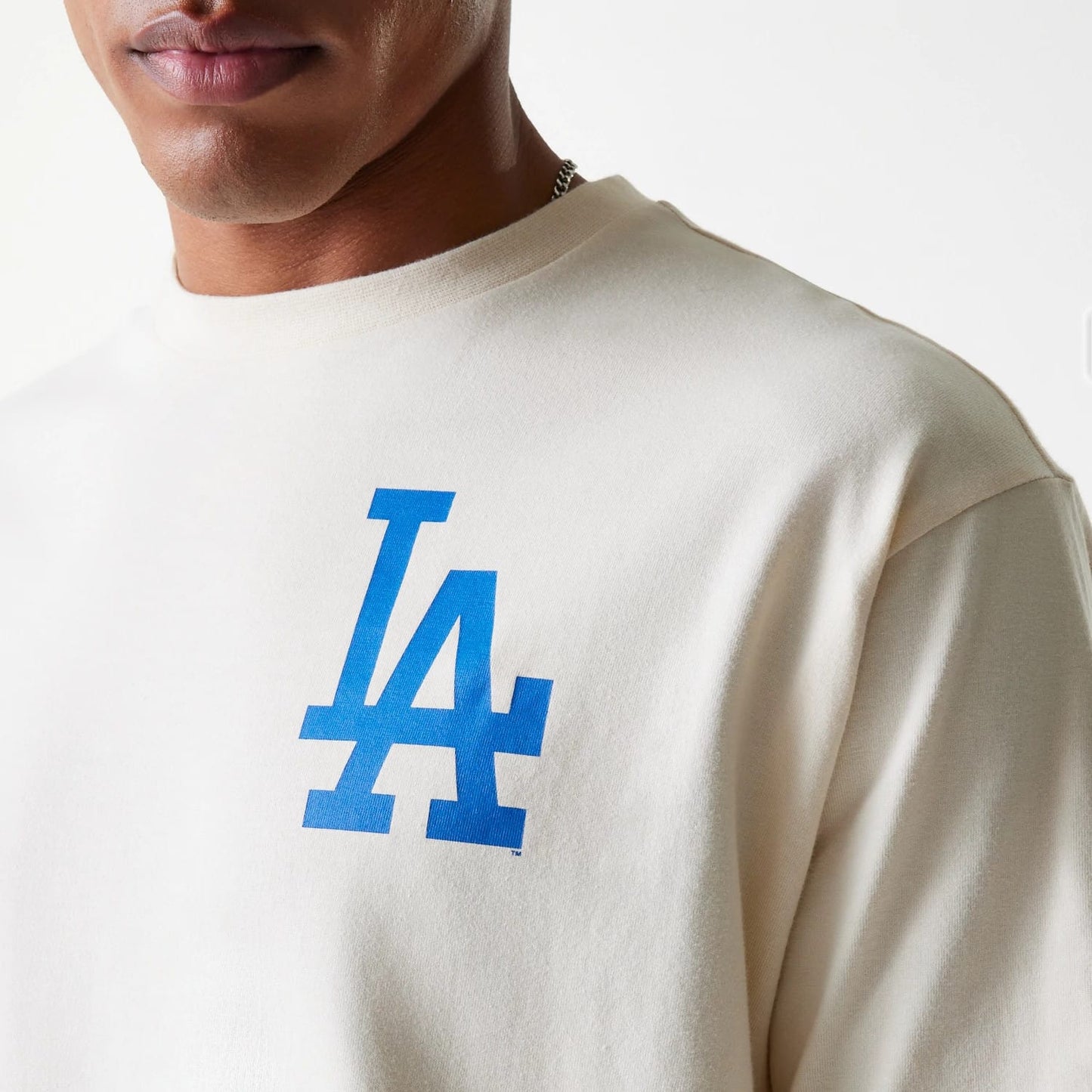 The Male model is wearing LA Dodgers MLB Baseball Graphic Light Beige Oversized T-Shirt 6