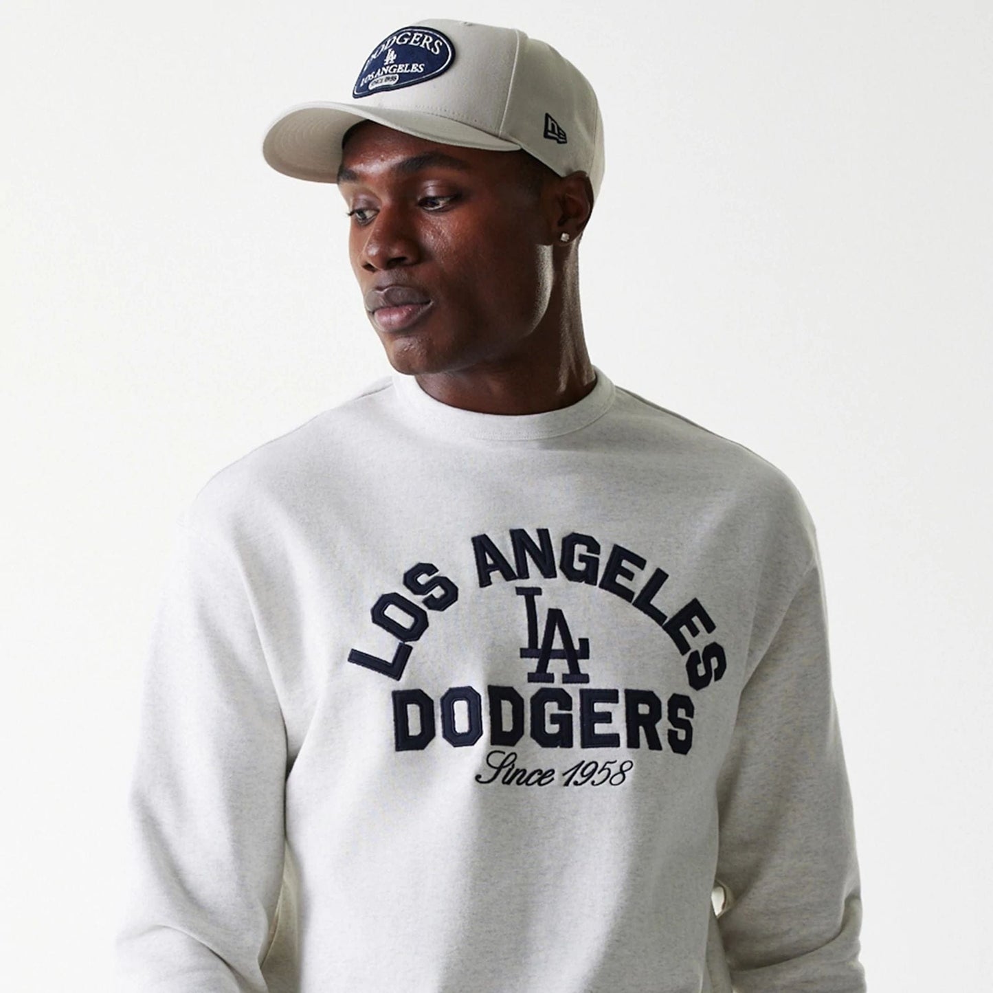 The Male model is wearing LA Dodgers MLB Heritage Pastel Grey Oversized Crew Neck Sweater 5