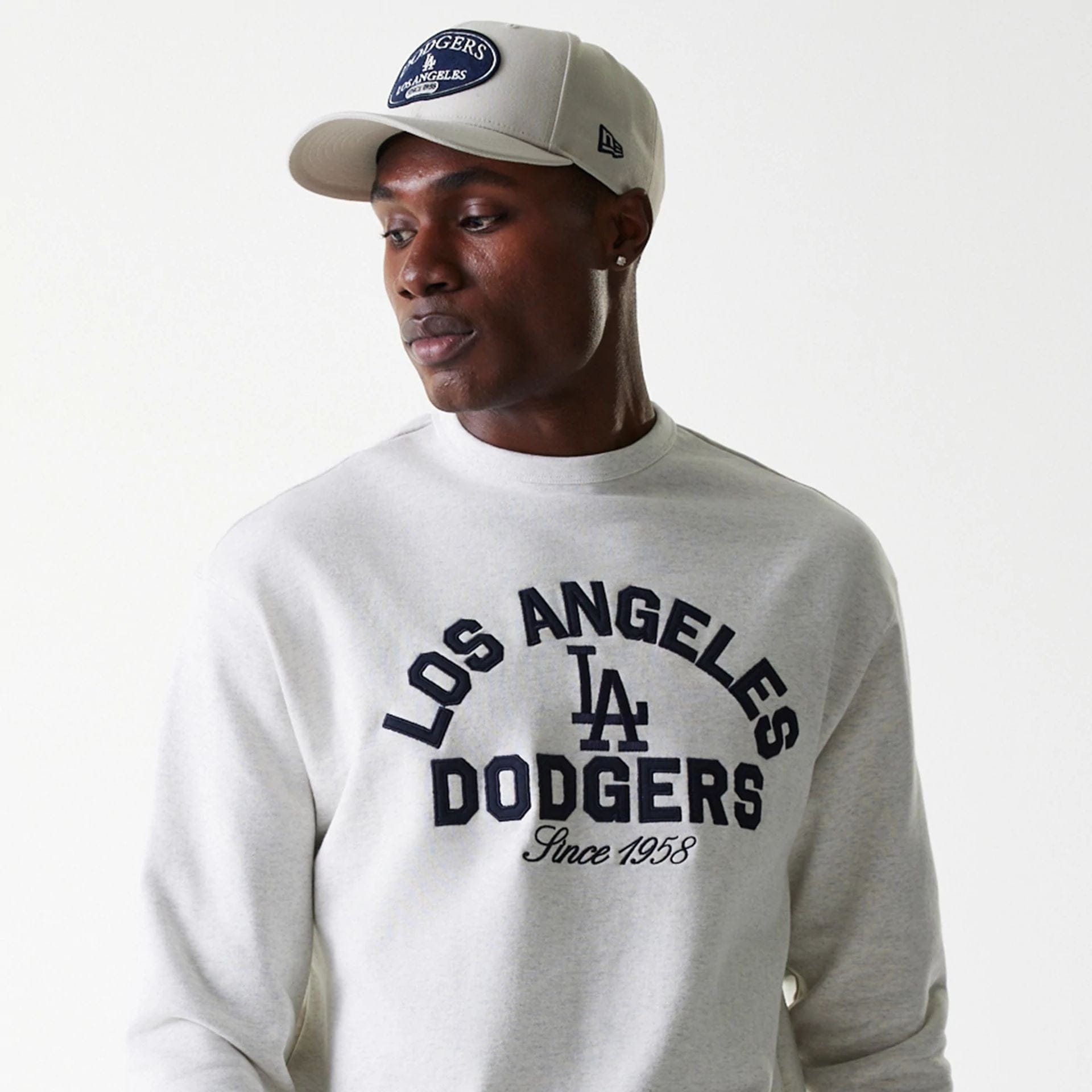The Male model is wearing LA Dodgers MLB Heritage Pastel Grey Oversized Crew Neck Sweater 5