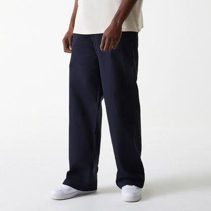 The Male model is wearing LA Dodgers MLB Navy Chino Trousers 3