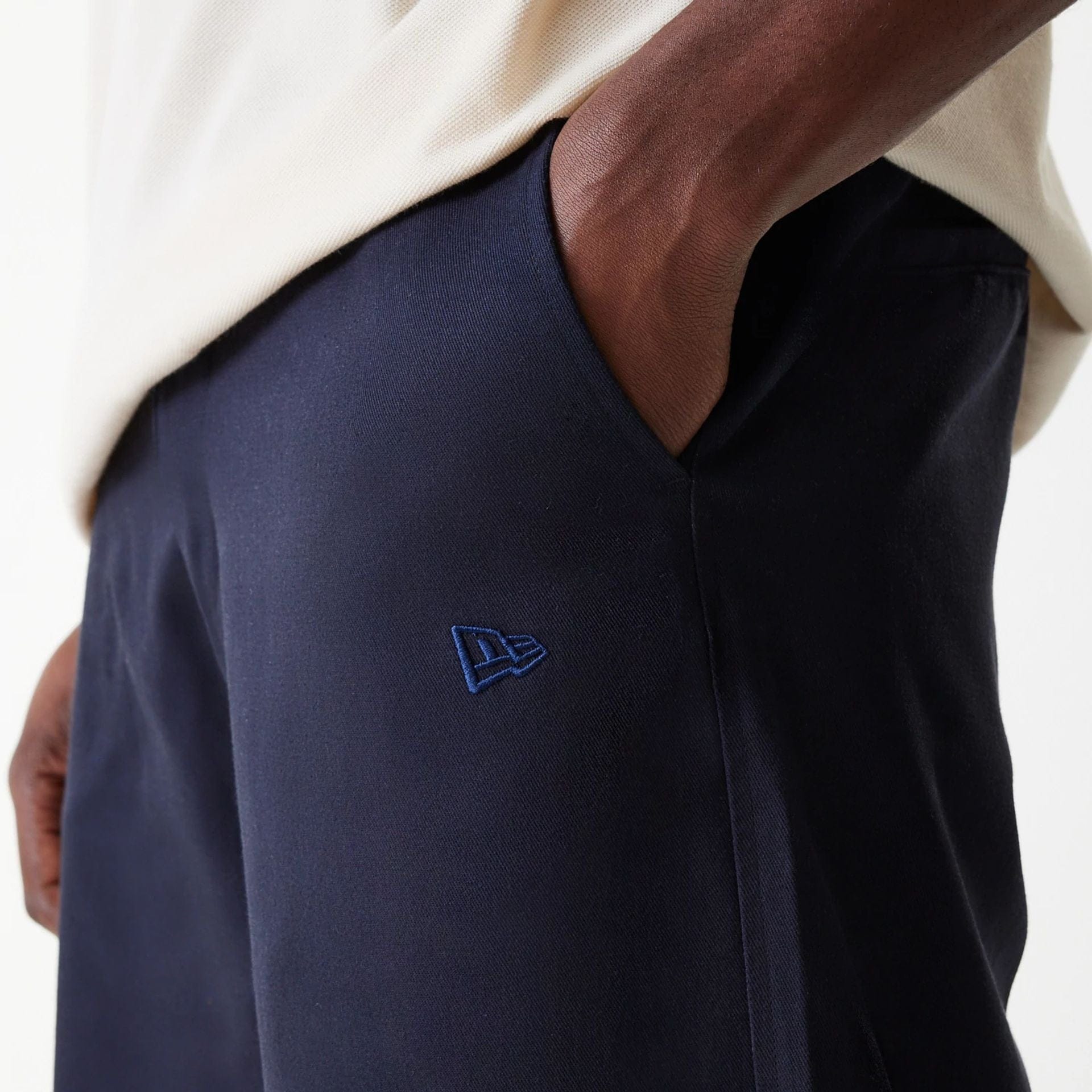 The Male model is wearing LA Dodgers MLB Navy Chino Trousers 6