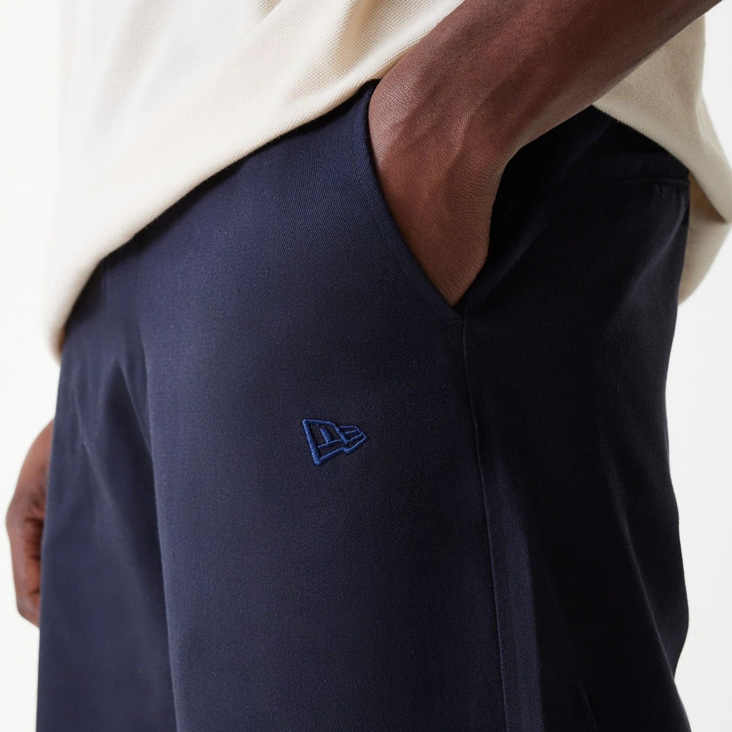 The Male model is wearing LA Dodgers MLB Navy Chino Trousers 6