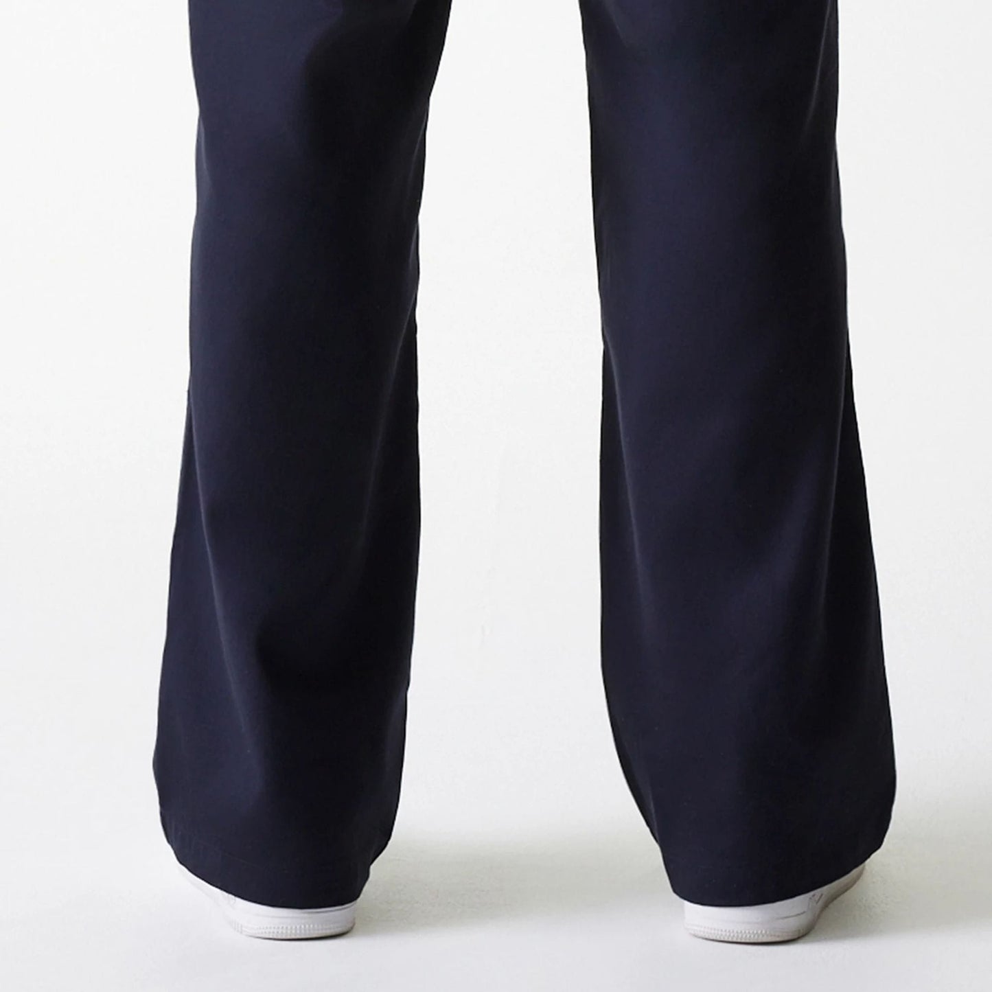 The Male model is wearing LA Dodgers MLB Navy Chino Trousers 7
