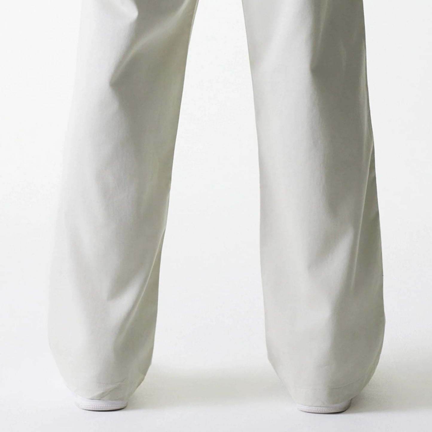 The Male model is wearing New York Yankees MLB Light Beige Chino Trousers 7