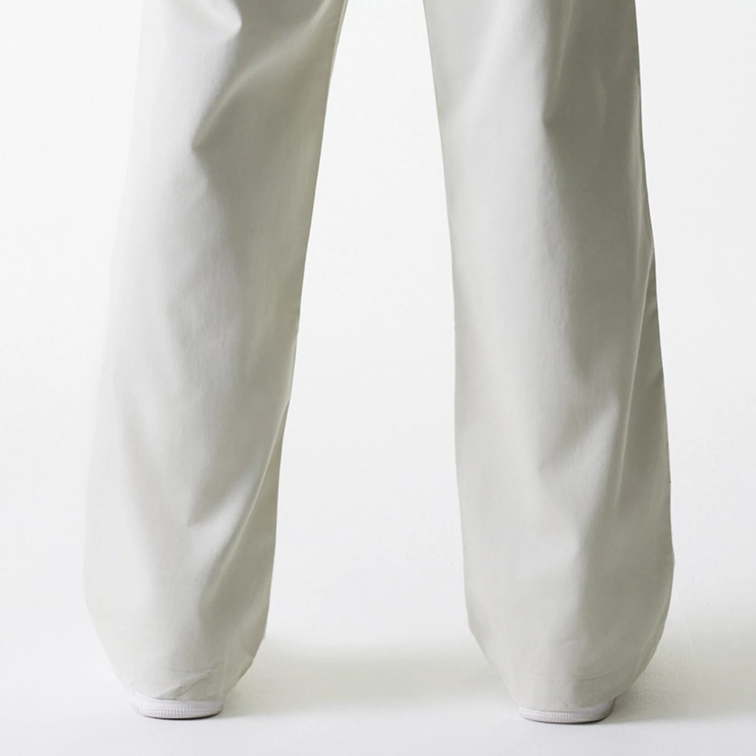 The Male model is wearing New York Yankees MLB Light Beige Chino Trousers 7