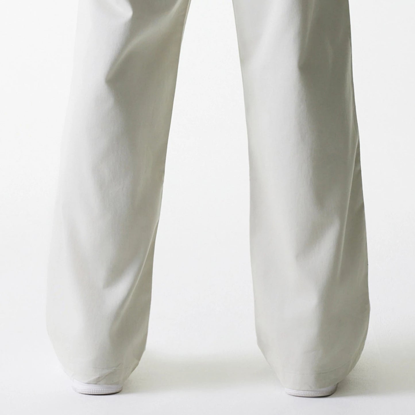 The Male model is wearing New York Yankees MLB Light Beige Chino Trousers 7