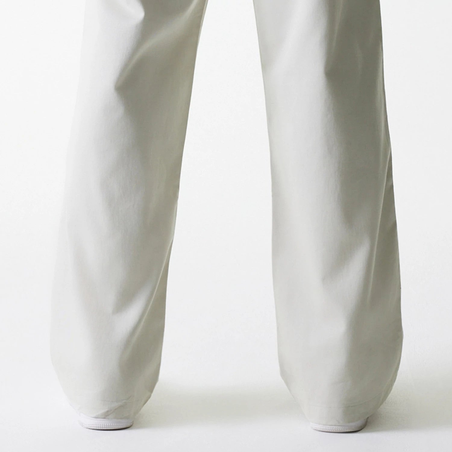 The Male model is wearing New York Yankees MLB Light Beige Chino Trousers 7