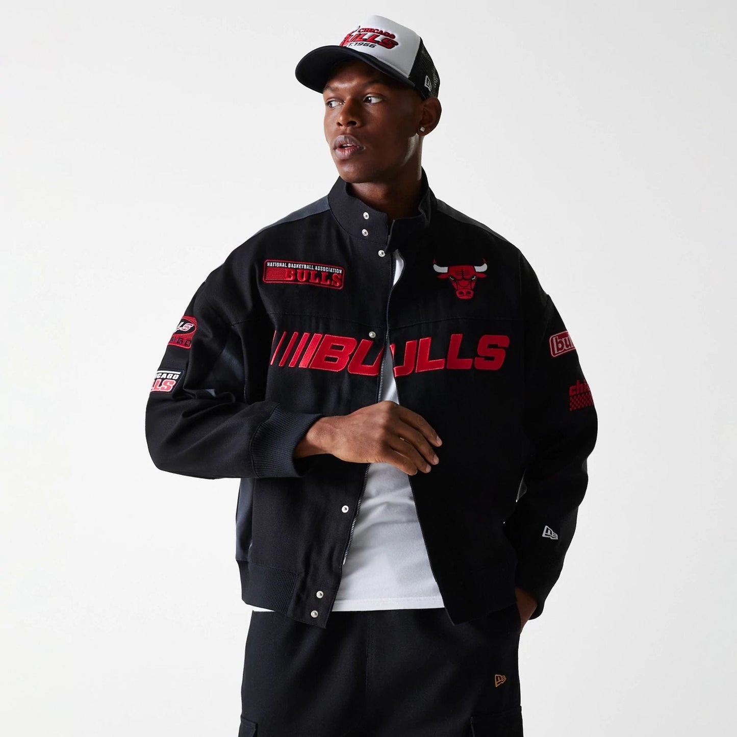 The Male model is wearing Chicago Bulls NBA Motorsport Black Motorsports Jacket 3