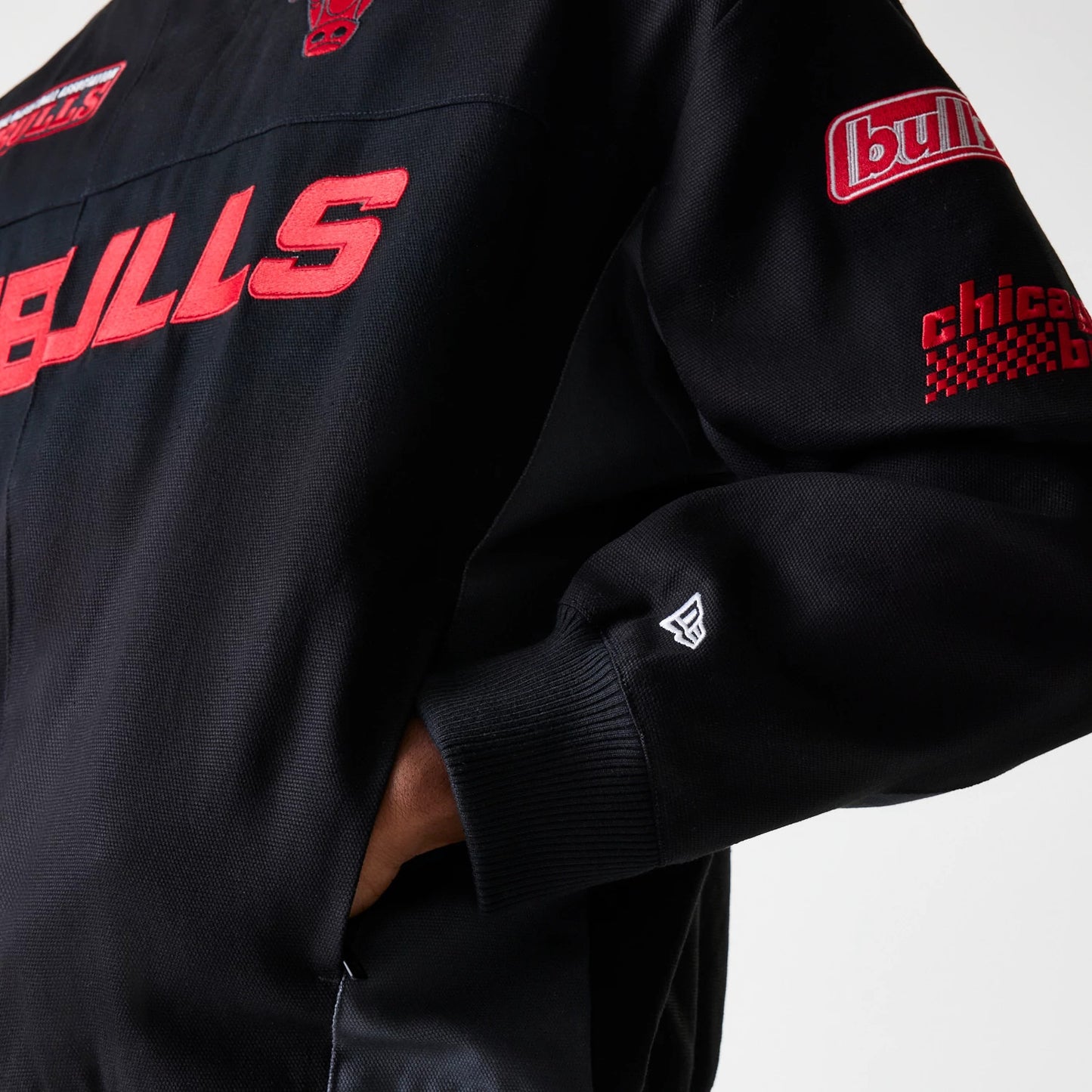 The Male model is wearing Chicago Bulls NBA Motorsport Black Motorsports Jacket 5